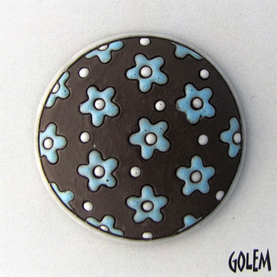 round domed cabochon, blue flowers on dark