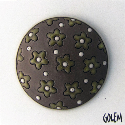round domed cabochon, green flowers on dark