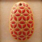 oval, coral lieves, yellow dots