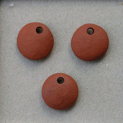 Unglazed pair of charms, terracotta
