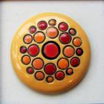round cabochon, yellow and red