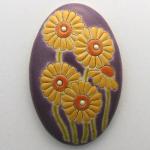 oval domed cabochon, daisies on purple