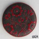 large round cabochon, red on dark clay