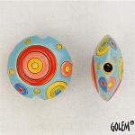 Circles,red & yellow on blue lentil bead size M
