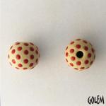 Red polka dots on off white