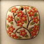 Pendant with blooming tree, coral