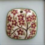 Pendant with blooming tree, maroon