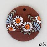 White and blue flowers on terracotta pendant