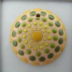 round, green/yellow circles on white bac