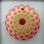 round, red/yellow circles on white backg