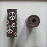 Peace signs on dark tube