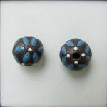 Dark round bead, neon blue leaves