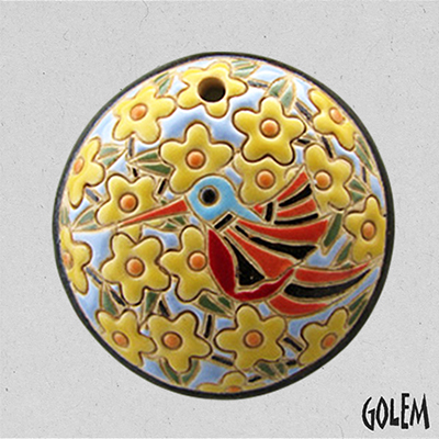 round pendant with humingbird