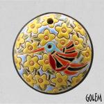 round pendant with humingbird